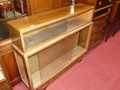 Lot 1226 - An Art Deco walnut low display cabinet, having...