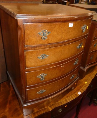 Lot 1230 - A mid-20th century figured walnut bowfront...