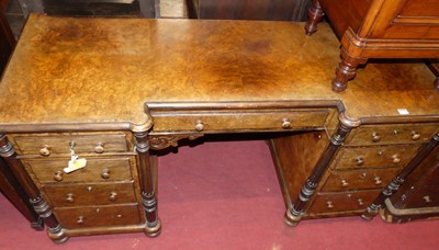 Lot 1236 - A mid-Victorian figured walnut kneehole...