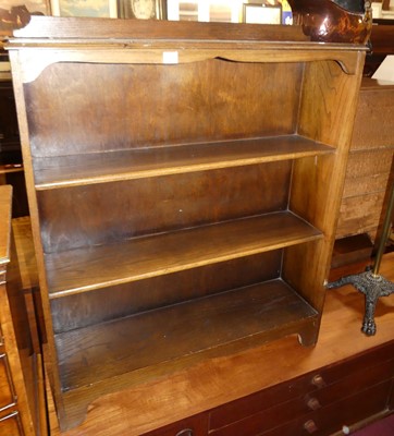 Lot 1254 - A mid-20th century oak ledgeback low...