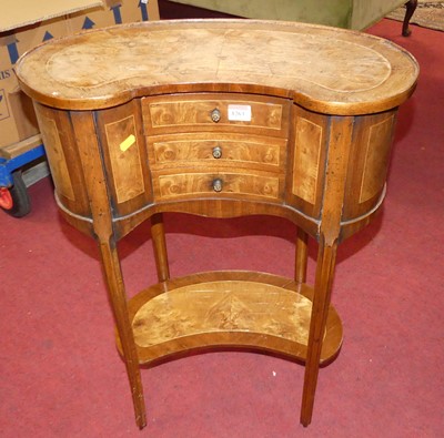 Lot 1263 - A French walnut and figured walnut kidney...