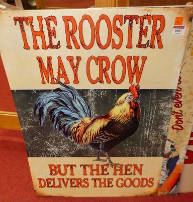 Lot 1087 - A printed tin sign 'The rooster may crow', 70...