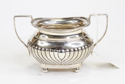 Lot 307 - A George V silver twin handled sugar bowl, of...