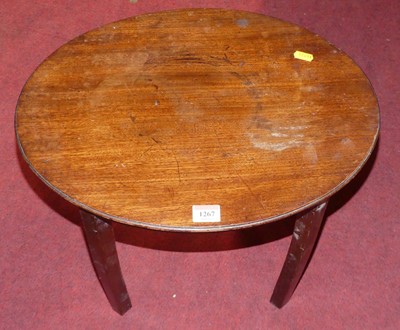 Lot 1267 - A small mahogany oval low occasional table,...