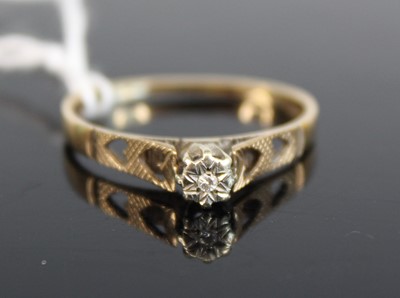 Lot 330 - A modern 9ct gold diamond solitaire ring, the...