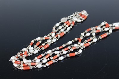 Lot 347 - A white metal cultured pearl and coral set...