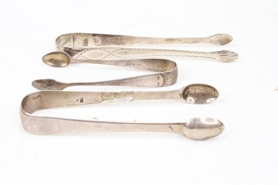 Lot 421 - A pair of George III silver sugar tongs,...