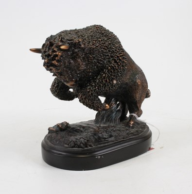 Lot 212 - A bronzed model of a bison rearing, height 16cm