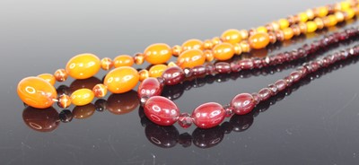 Lot 369 - A cherry amber single string necklace,...