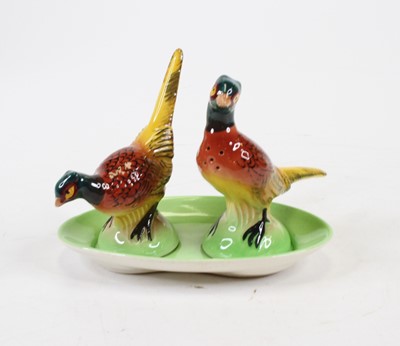 Lot 223 - A Carlton ware salt & pepper, each in the form...