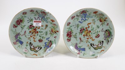 Lot 227 - A pair of 19th century Chinese celadon plates,...