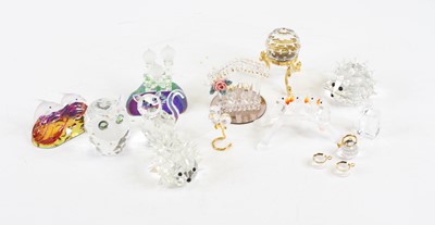 Lot 230 - A collection of Swarovski crystal models of...