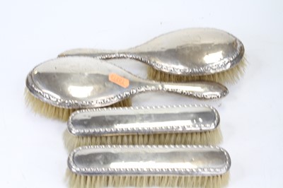 Lot 432 - A pair of Edwardian silver backed hairbrushes;...