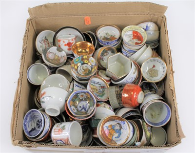 Lot 234 - A collection of Asian porcelain miniature tea...