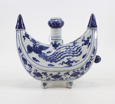 Lot 235 - A Chinese blue & white porcelain table candle...