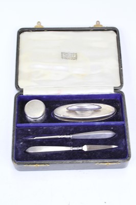 Lot 439 - A George V lady's silver mounted four-piece...