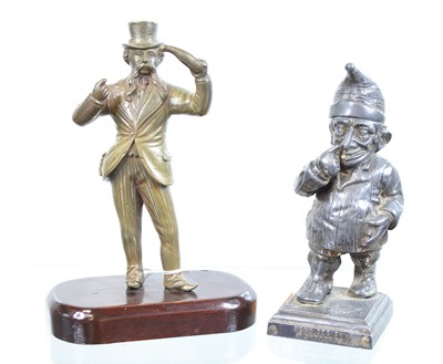 Lot 512 - A novelty pewter table lighter, of figural...