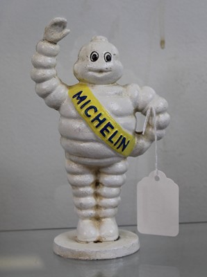 Lot 511 - A cast iron figure of the Michelin Man, height...