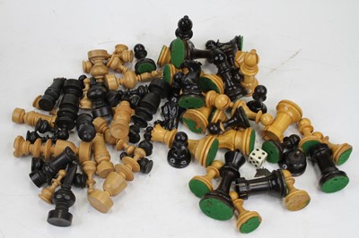 Lot 493 - A set of turned ebony and boxwood chess pieces,...