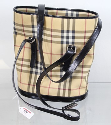 Lot 558 - A Burberry handbag, having tartan exterior,...