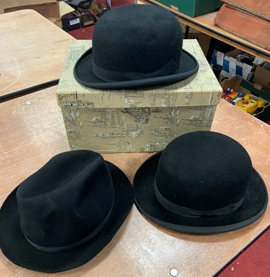 Lot 679 - A vintage bowler hat, size 7⅛, retailed by...