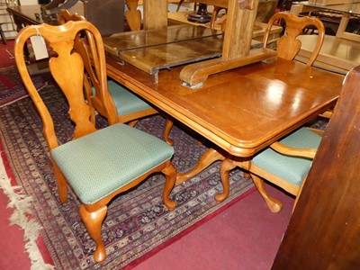 Lot 1282 - A contemporary cherry wood dining suite,...