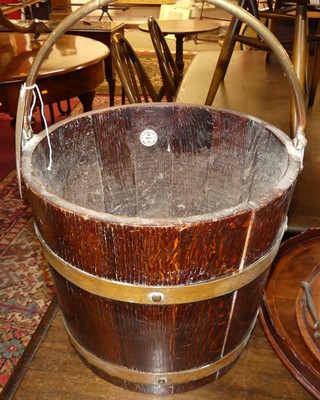 Lot 1308 - An early 20th century coopered oak bucket,...