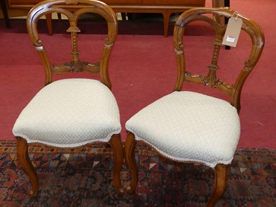 Lot 1315 - A pair of Victorian walnut balloonback salon...