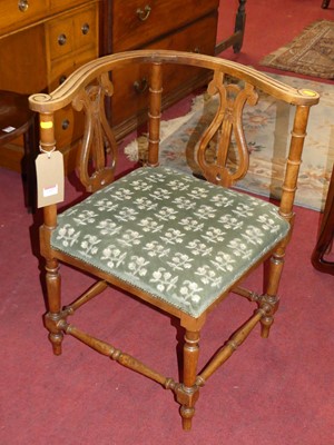 Lot 1317 - A late 19th century walnut corner tub chair,...