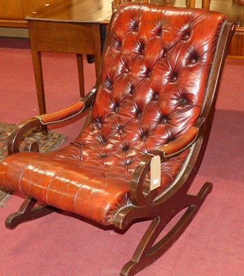 Lot 1322 - A mahogany and burgundy leather buttoned and...