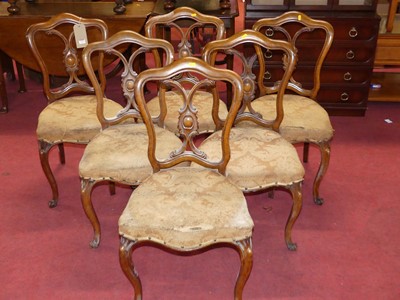 Lot 1333 - A set of six mid-Victorian walnut balloonback...