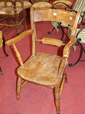 Lot 1340 - An early 20th century elm and fruitwood...