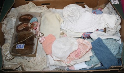 Lot 640 - A collection of dolls clothing to include...