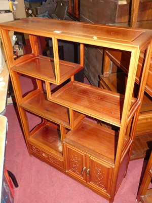 Lot 1360 - A contemporary Eastern hardwood low display...