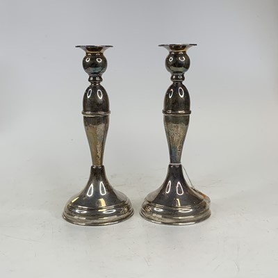 Lot 268 - A pair of continental white metal table candle...