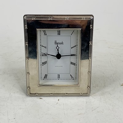 Lot 271 - An Elizabeth II silver clad desk clock, the...