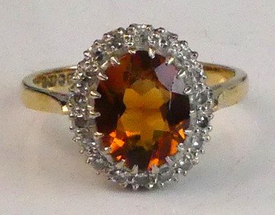 Lot 2541 - An 18ct yellow and white gold, citrine and...