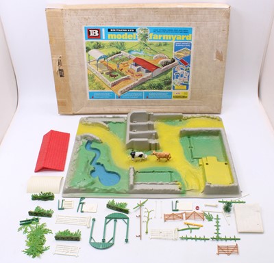 Lot 1954 - A Britains No.4711 Model Farm Yard, housed in...