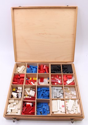 Lot 180 - Lego 1970s/80s wooden storage box containing a...