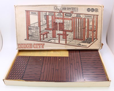 Lot 1884 - A Marx Toys of Swansea Dodge City wooden Lone...