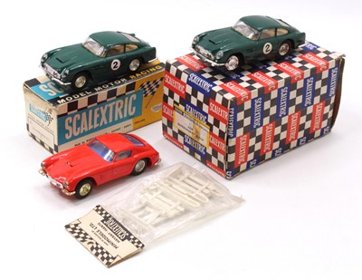 Lot 1867 - A collection of boxed and loose Scalextric...