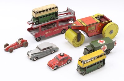 Lot 1537 - A collection of play worn Dinky and Corgi Toys,...