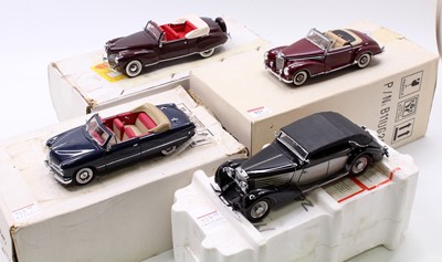 Lot 927 - A collection of four boxed Franklin Mint 1/24...