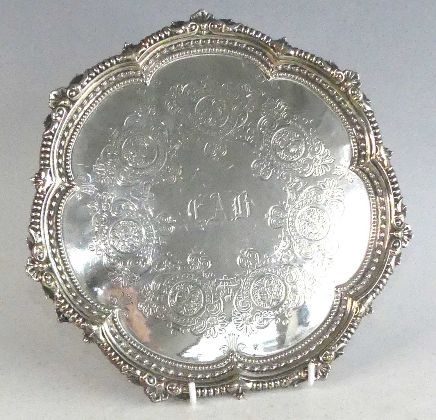 Lot 2101 - A late Victorian silver salver, of shaped...