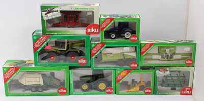 Lot 1951 - Siku Farmer Series 1/32nd scale boxed model...