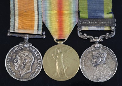 Lot 287 - A group of three medals to include WW I...