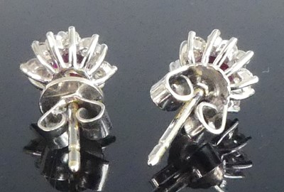 Lot 2559 - A pair of 18ct white gold, ruby and diamond...
