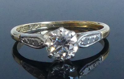 Lot 2561 - A yellow and white metal diamond solitaire...