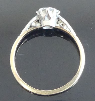 Lot 2561 - A yellow and white metal diamond solitaire...