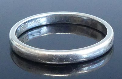 Lot 2565 - A platinum 2.3mm D-shaped wedding band, size L,...